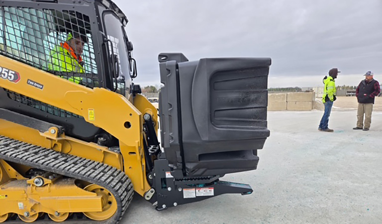 Skid loader operator with SiteTote Skid loader operator with SiteTote